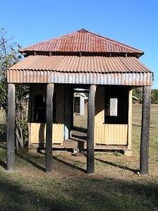 Front of a miners cottage on a sunny day